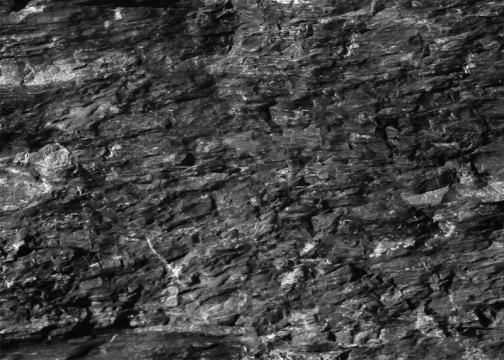 夹杂着白色石英石的黑色石头煤层背景图8546068图片素材